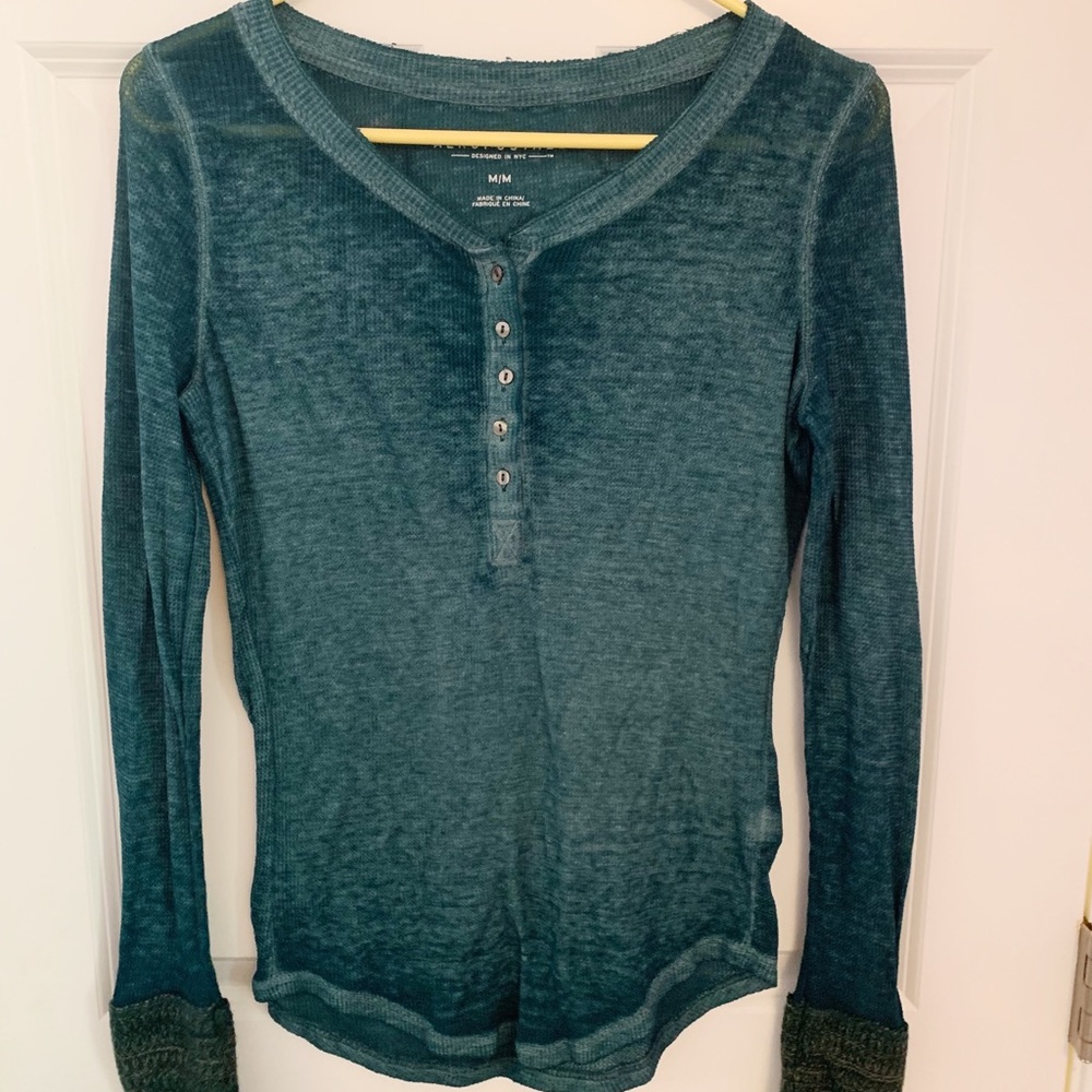 green long sleeve top